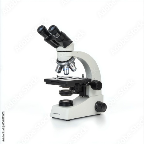 A microscope on a plain background. 