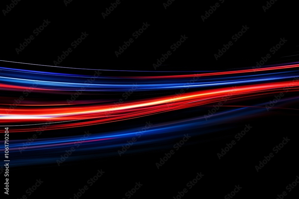 Abstract light trails in vibrant red and blue on a dark background, creating a dynamic and energetic visual effect. Abstract light trails in vibrant red and blue on a dark background, creating a dynamic and energetic visual effect.