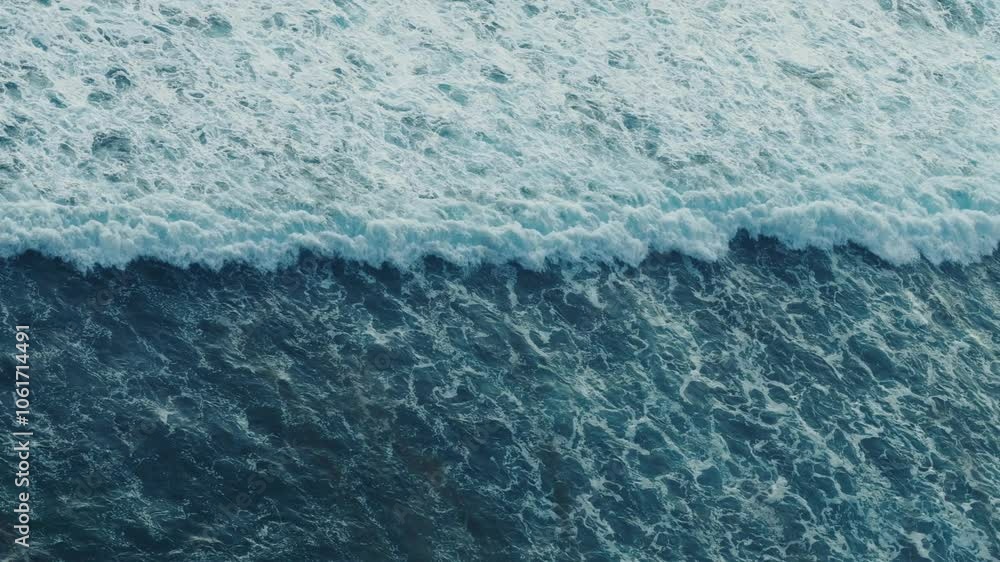 Waves of serenity aerial view reveals peaceful yet powerful movement ocean waves stunning nature. Oceanic symphony drone aerial view ocean waves majestic rise and fall of sea ocean surface.