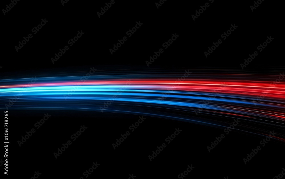 Dynamic abstract light trails in red and blue on a black background, creating a sense of movement and energy. Dynamic abstract light trails in red and blue on a black background, creating a sense of movement and energy.
