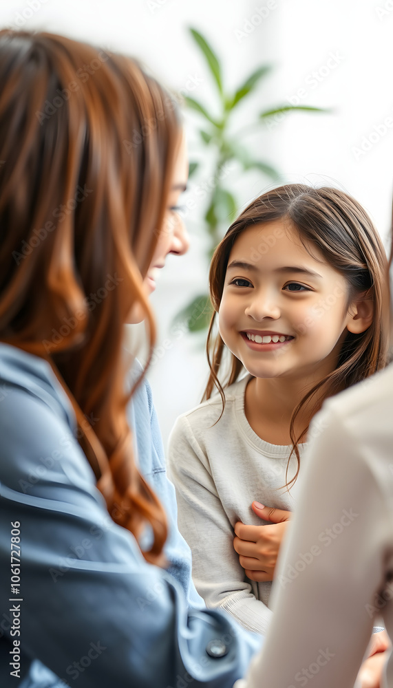 Don't be afraid to talk about emotions. Happy teen girl in meeting with professional child psychologist talks about emotions. Cheerful girl shows female psychologist painted smiling smiley isolated Don't be afraid to talk about emotions. Happy teen girl in meeting with professional child psychologist talks about emotions. Cheerful girl shows female psychologist painted smiling smiley isolated