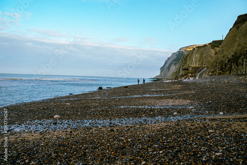 rock beach sand sea shore photo