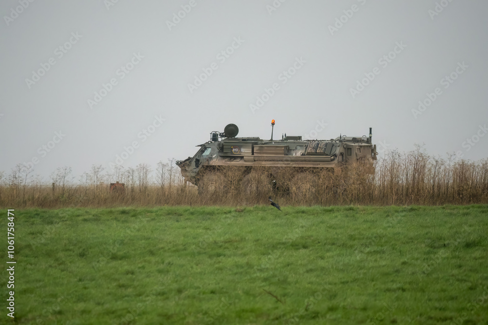 Fototapeta premium British army Patria Pasi Fuchs (Falcon Squadron) armoured 6x6 vehicle on a military exercise, Wiltshire UK