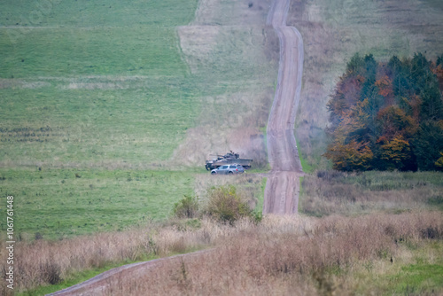 Valokuva British army Warrior FV510 light infantry fighting vehicle tank in action on a m