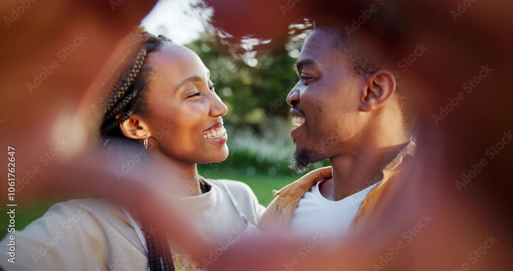 Hand, black couple and heart sign with kiss outdoor of healthy relationship, commitment and romance trust. People, love icon and bonding together with loyalty, care and save the date of marriage news