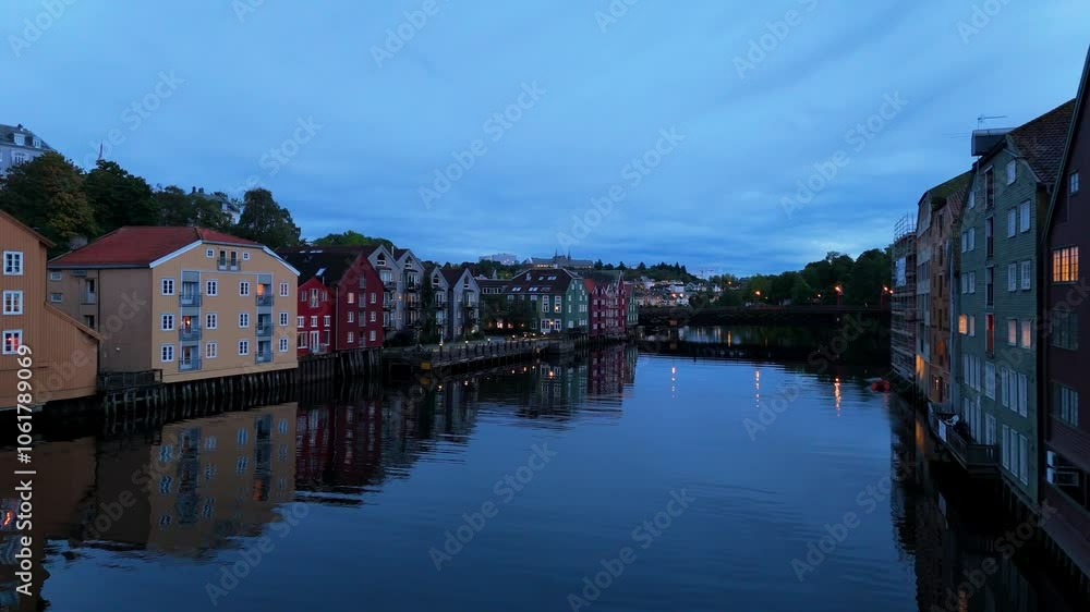 Trondheim houses near the water, Norway, aerial shot, drone video, in blue hour Trondheim houses near the water, Norway, aerial shot, drone video, in blue hour