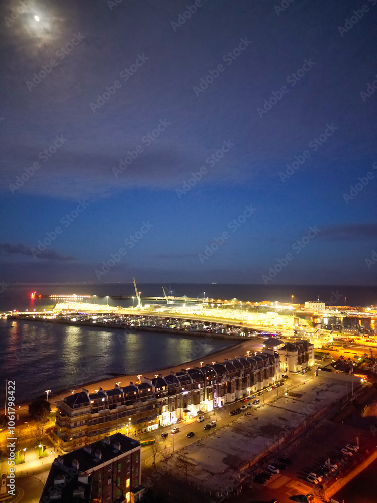 High Angle Night View of Dover Coastal City of South Eastern County of Kent England, United Kingdom. The Illuminated Footage Was Captured with Drone's Camera after Sunset Night of April 20th, 2024 High Angle Night View of Dover Coastal City of South Eastern County of Kent England, United Kingdom. The Illuminated Footage Was Captured with Drone's Camera after Sunset Night of April 20th, 2024