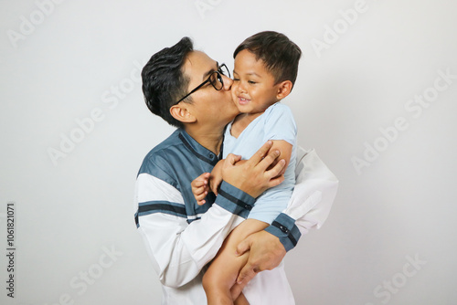 Beautiful Family Asking For Forgiveness on Hari Raya Aidilfitri/ Eid-Ul-Fitr photo