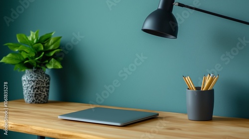Minimalist Workspace with Green Background