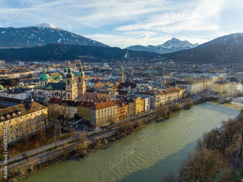 Innsbruck at evening, Aerial Drone Shot of a Beautiful winter City Skyline, Surrounded by Alps Mountains in Austria