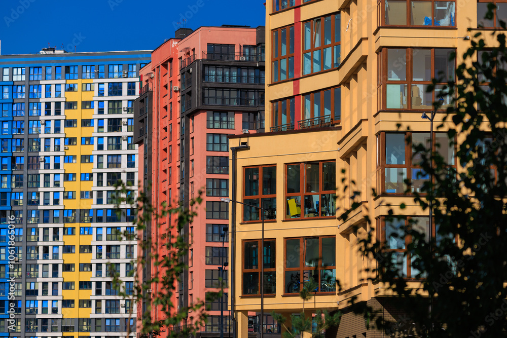 City view, modern buildings and skyscrapers against the blue sky. City view, modern buildings and skyscrapers against the blue sky.