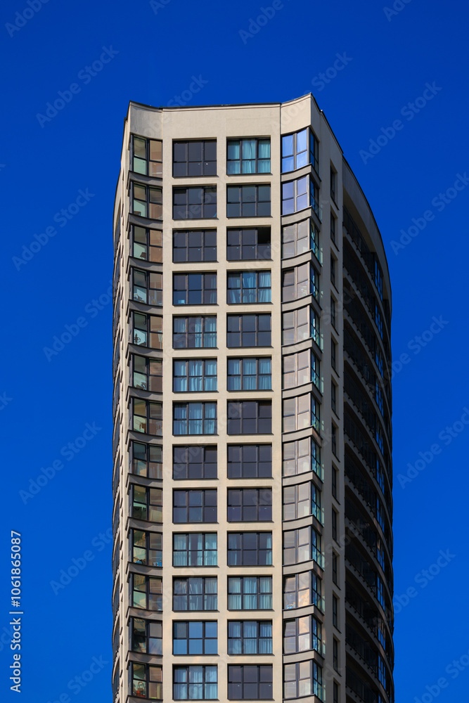 City view, modern buildings and skyscrapers against the blue sky. City view, modern buildings and skyscrapers against the blue sky.