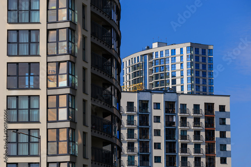 City view, modern buildings and skyscrapers against the blue sky.