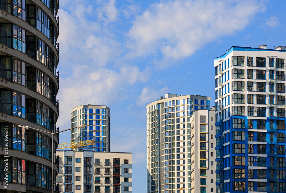 City view, modern buildings and skyscrapers against the blue sky. City view, modern buildings and skyscrapers against the blue sky.