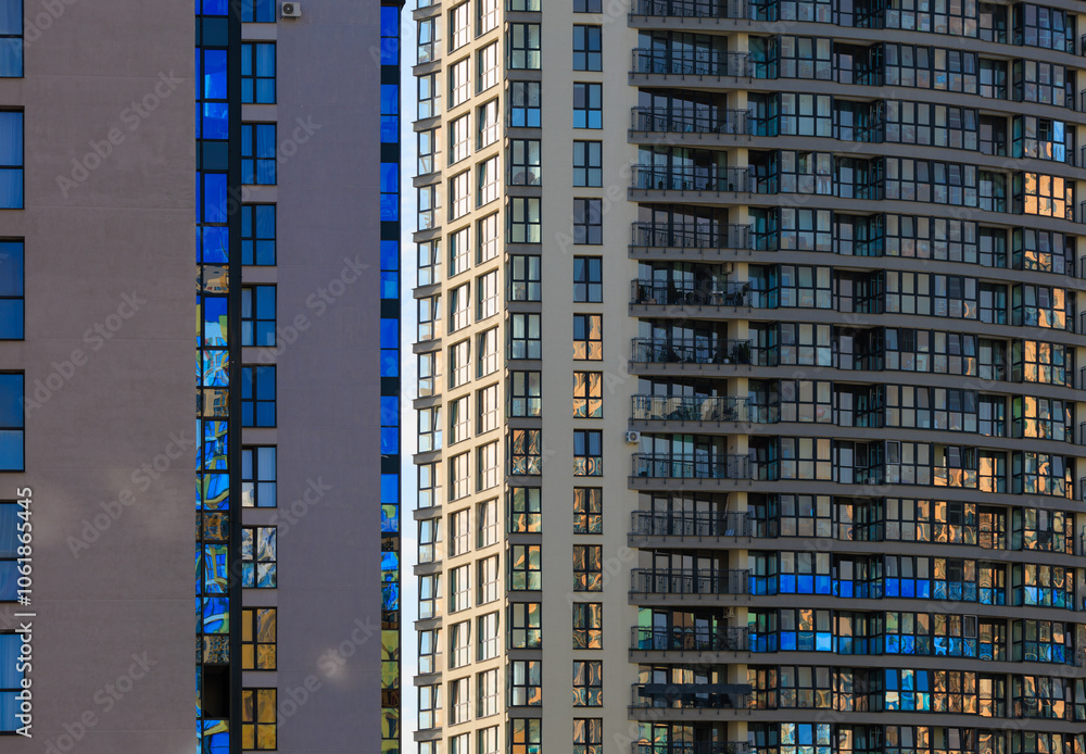 City view, modern buildings and skyscrapers against the blue sky. City view, modern buildings and skyscrapers against the blue sky.