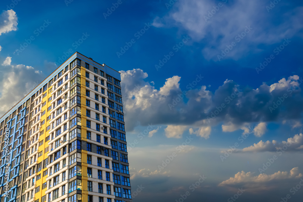 City view, modern buildings and skyscrapers against the blue sky.