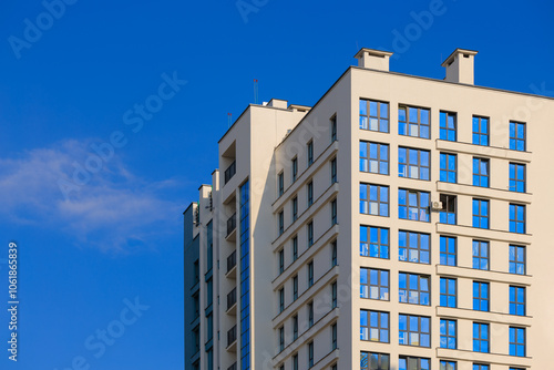 City view, modern buildings and skyscrapers against the blue sky.