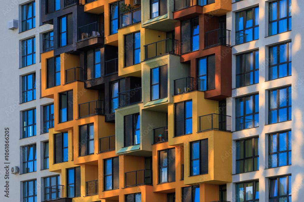 Texture of modern buildings, background for design. Elements of architectural decorations of buildings, modern windows, walls and balconies.