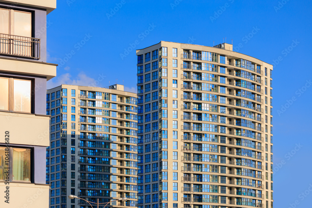 City view, modern buildings and skyscrapers against the blue sky. City view, modern buildings and skyscrapers against the blue sky.