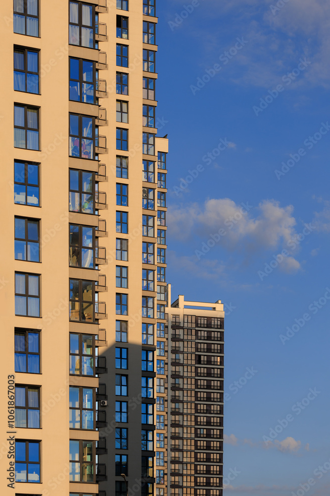 City view, modern buildings and skyscrapers against the blue sky. City view, modern buildings and skyscrapers against the blue sky.