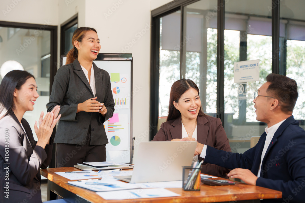 Group of Asian businessmen Sitting in meetings, talking, exchanging knowledge, presenting work. Group of Asian businessmen Sitting in meetings, talking, exchanging knowledge, presenting work.