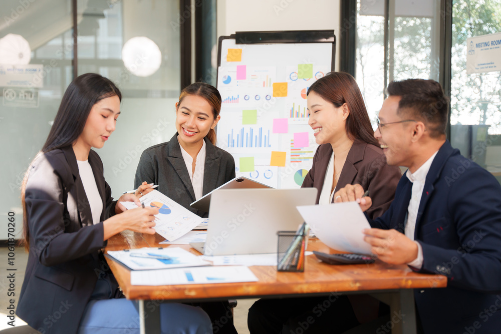 Group of Asian businessmen Sitting in meetings, talking, exchanging knowledge, presenting work. Group of Asian businessmen Sitting in meetings, talking, exchanging knowledge, presenting work.