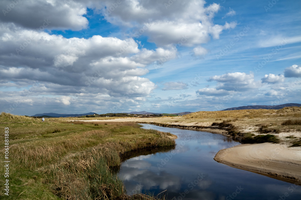 The stream that flows from Sheskinmore Nature Reserve to Ballinravey Strand between Ardara and Portnoo in Donegal - Ireland The stream that flows from Sheskinmore Nature Reserve to Ballinravey Strand between Ardara and Portnoo in Donegal - Ireland