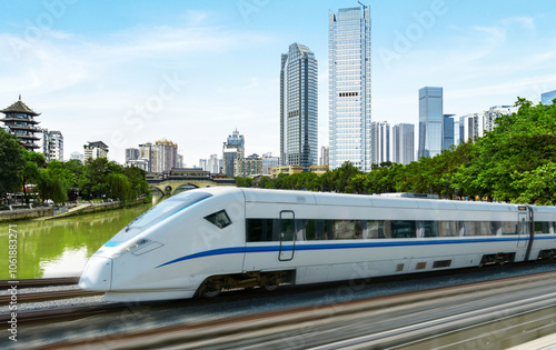 High-speed rail speeds on Bridges and the modern city skyline of chongqing, China #1061883271