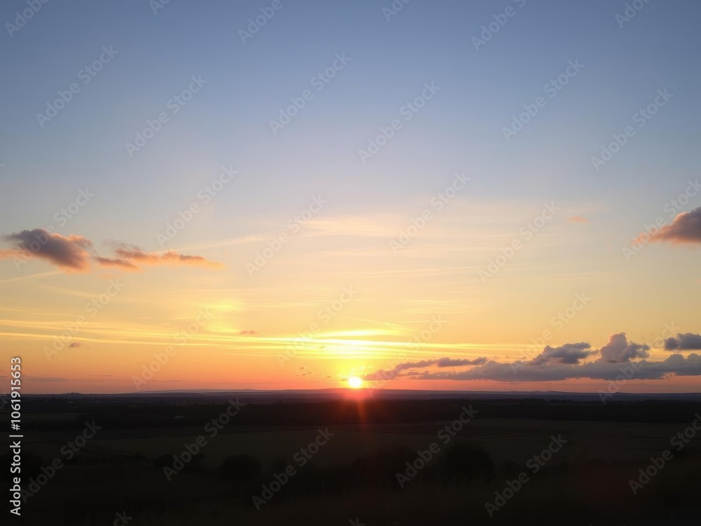 A vibrant sunrise over a calm lake, with beautiful colors reflecting on the water, landscape, new day A vibrant sunrise over a calm lake, with beautiful colors reflecting on the water, landscape, new day