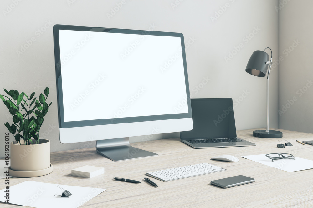 Side view on blank white modern computer monitor with copyspace in home office with light wall, dark laptop and lamp, flowerpot and smartphone on wooden table. 3D rendering, mockup Side view on blank white modern computer monitor with copyspace in home office with light wall, dark laptop and lamp, flowerpot and smartphone on wooden table. 3D rendering, mockup