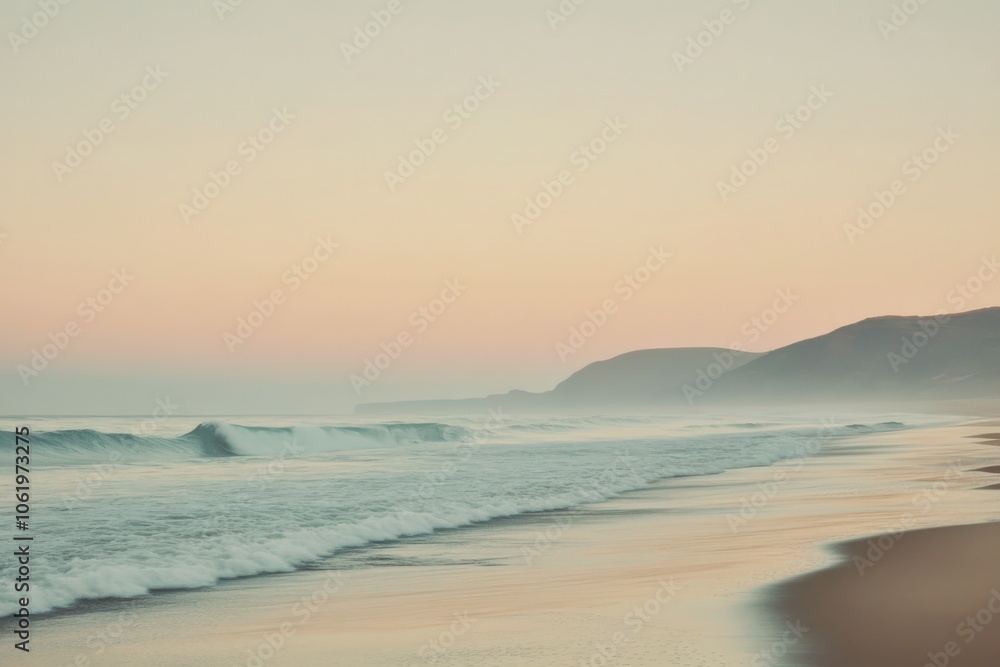 Breathtaking sunset over a sandy beach with gentle waves and soft sky colors at dusk Breathtaking sunset over a sandy beach with gentle waves and soft sky colors at dusk