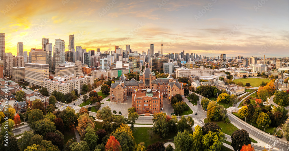 Toronto, Ontario, Canada panoramic skyline at dawn in early autumn.