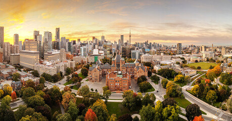 Toronto, Ontario, Canada panoramic skyline at dawn in early autumn.