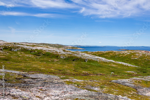 Expansive Coastal Landscape Under A Clear Blue Sky