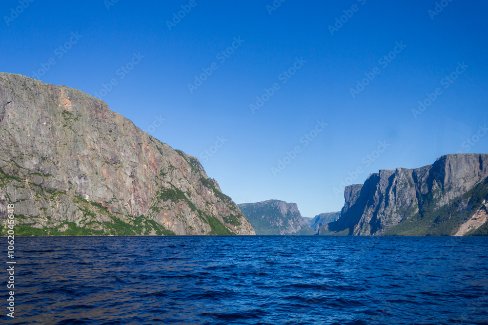 Majestic Fjord Landscape with Clear Blue Skies Majestic Fjord Landscape with Clear Blue Skies