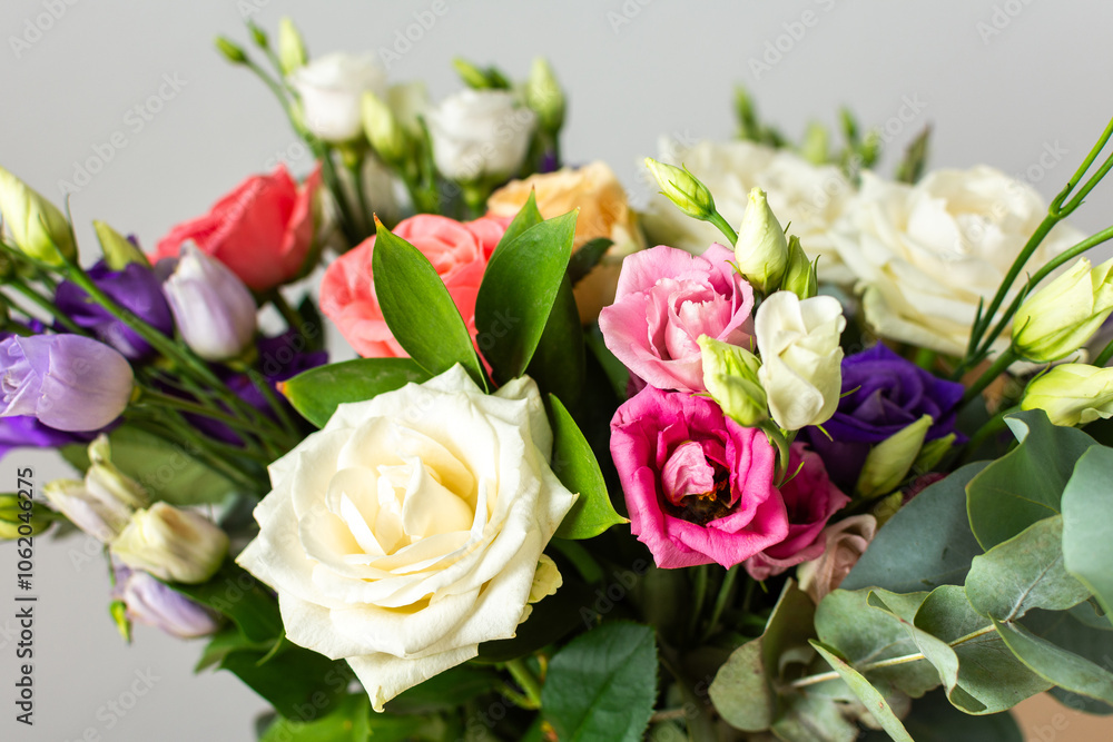 Celebrate special occasions with a colorful summer bouquet featuring fresh roses, eucalyptus, and eustoma blooms, creating an elegant and fragrant floral arrangement Celebrate special occasions with a colorful summer bouquet featuring fresh roses, eucalyptus, and eustoma blooms, creating an elegant and fragrant floral arrangement