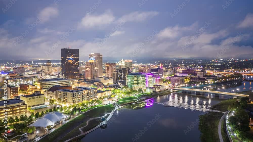 Dayton, Ohio, USA downtown cityscape on the Miami River at dusk. Dayton, Ohio, USA downtown cityscape on the Miami River at dusk.