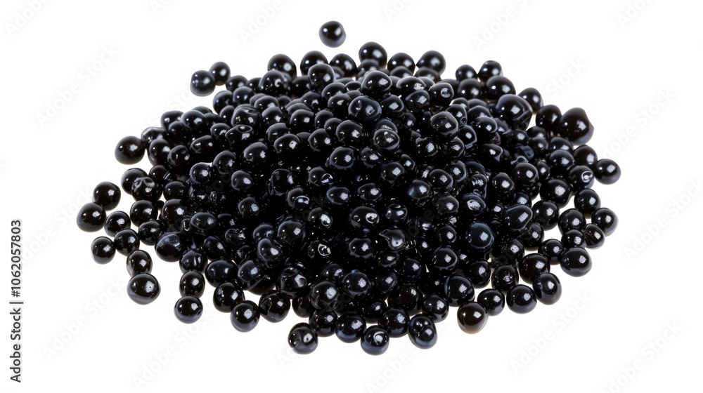 A collection of round, dark-colored, possibly glass, beads on a plain white background. These small, shiny spheres could be used for various purposes including jewelry and craft projects. A collection of round, dark-colored, possibly glass, beads on a plain white background. These small, shiny spheres could be used for various purposes including jewelry and craft projects.