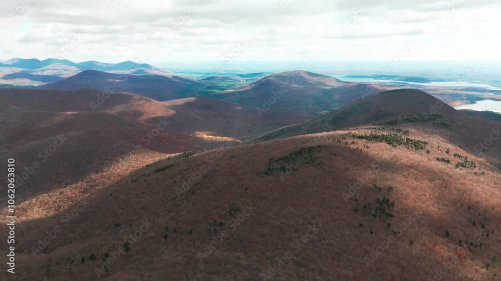 Scenic vibrant foliage view of Catskills mountains from above during sunrise Scenic vibrant foliage view of Catskills mountains from above during sunrise