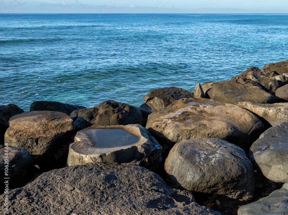 Lava Boulders on the Edge of the Ocean in Hawaii. Lava Boulders on the Edge of the Ocean in Hawaii.