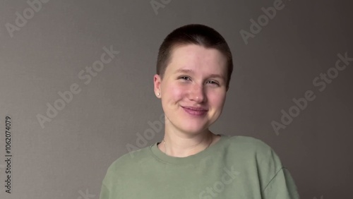 woman happy with short hair. buzz cut
