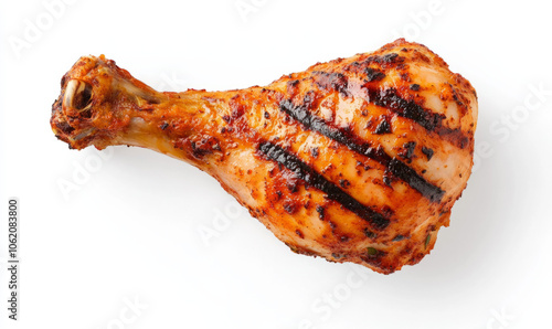 Grilled chicken leg quarter served on a white plate after cooking