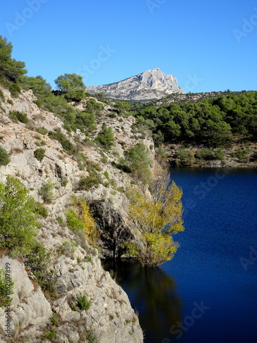 Sainte Victoire mountain near Aix en Provence seen from the lake of Zola Dam photo