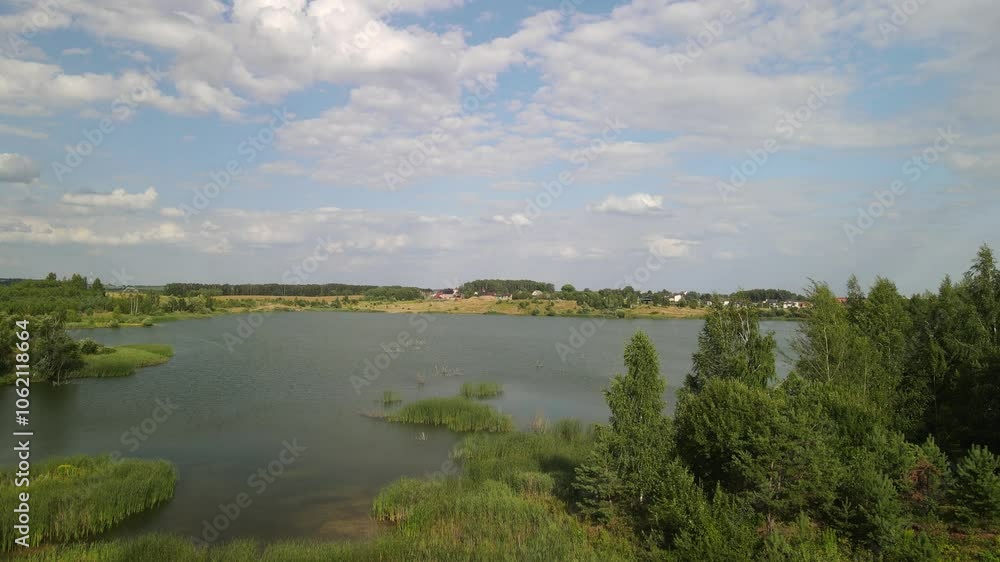 Aerial drone view of the river and green forests, landscape on a summer day Aerial drone view of the river and green forests, landscape on a summer day