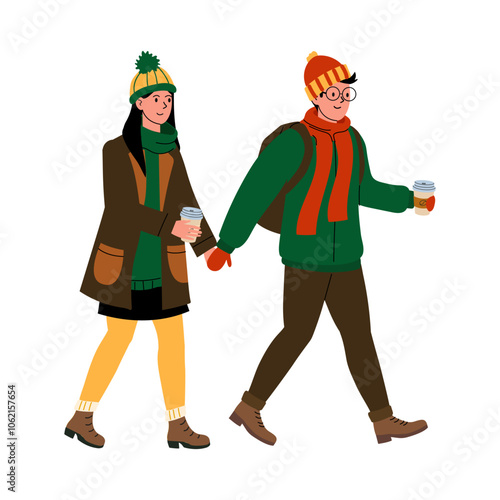 A couple enjoying a winter stroll with warm drinks in hand on a chilly day