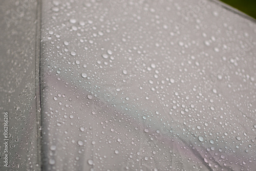Принти на полотні Close up shot of raindrops on the gray tent after a summer rain.