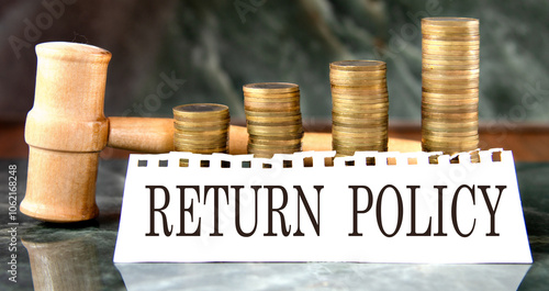 Wallpaper Mural RETURN POLICY - words on a white sheet with a judge's gavel and a stack of coins in the background Torontodigital.ca