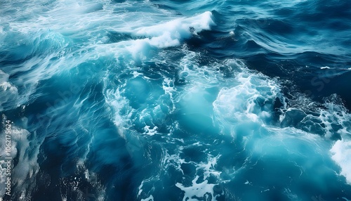 Pure blue turquoise water texture of the ocean sea with foam