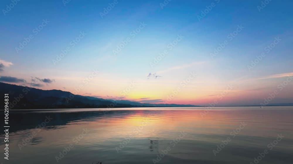 Timelapse of a beautiful sunset on the lake. Summer landscape Timelapse of a beautiful sunset on the lake. Summer landscape