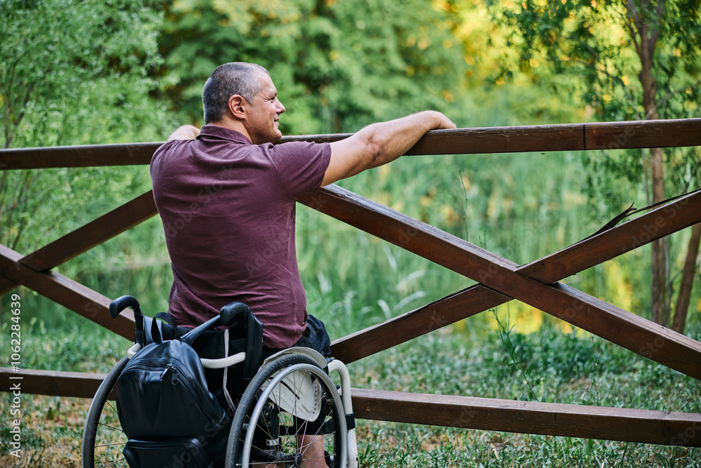 Man in Wheelchair Enjoying Nature Man in Wheelchair Enjoying Nature